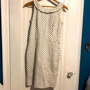 Sleeveless navy white polka dot dress